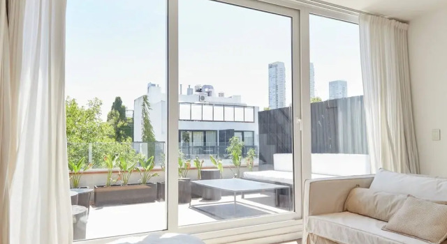 Unique triplex with rooftop private use