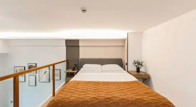 Двухместный люкс с балконом и с видом на море YUN MAN Suites Hotel