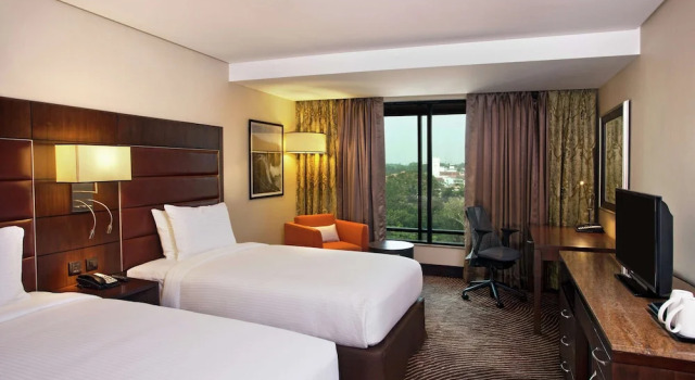 The Muthoot Plaza, Забронировать Отель Бизнес-отели Тируванантапурам, 4* 5*