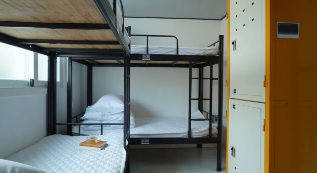 Кровать в общем номере NamSan203 Guest house