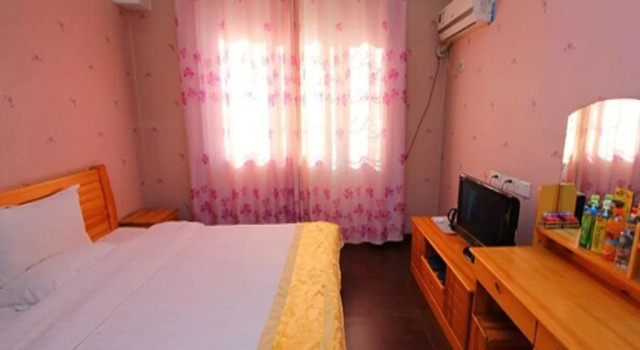 Qufu Lake Manor, Prenota Hotel Qufu Shandong