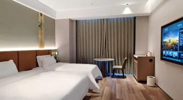 Семейный люкс Deluxe c 1 комнатой JOYCHENG HOTEL (Yichun Jingfa Avenue Branch)
