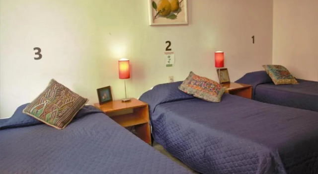 Кровать в общем номере (мужской номер) Hotel lit Guadalajara