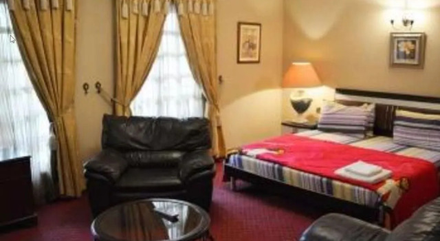 Manorgrove House Hotel, Boek Hotel 4-sterren hotels in Obio-Akp, 4*