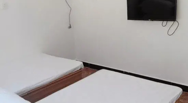 Кровать в общем номере Hongyu Farm House
