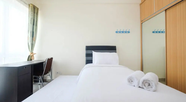 Номер Standard Cozy Minimalist Studio @ Taman Melati Margonda Apartment By Travelio