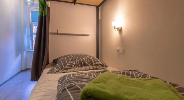 Cama en dormitorio compartido The RoadHouse Prague