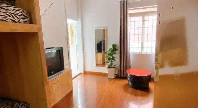 Кровать в общем номере Suris House Homestay