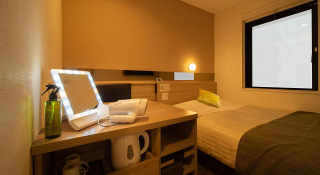 Кровать в общем номере (женский номер) Super Hotel Tokyo Hamamatsucho
