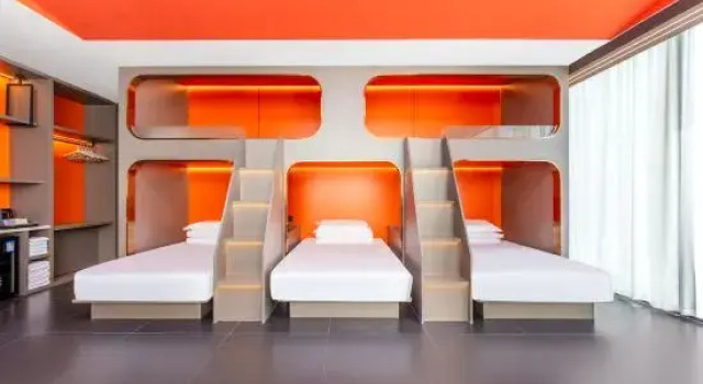 Кровать в общем номере Future Light Esports Hotel