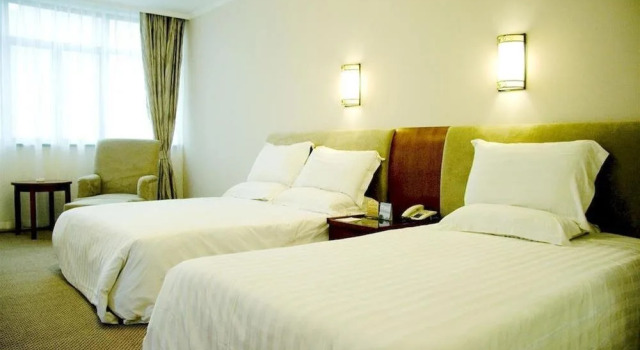 Shanghai Xinmin Hotel, Varaa Hotelli Zhabei 