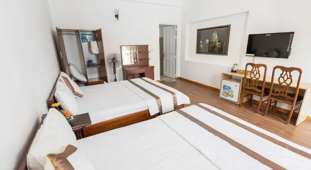 Четырёхместный семейный номер Standard Caroline Resort