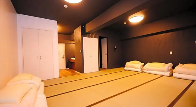 Кровать в общем номере (мужской номер) Hotel Japanesque Fukuoka