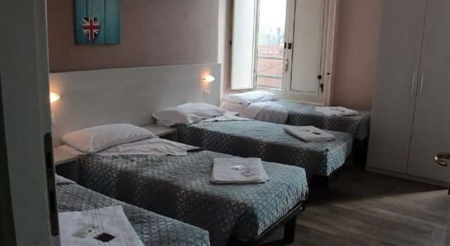 Кровать в общем номере (мужской номер) Hotel Kennedy
