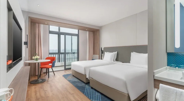 Четырёхместный номер Standard с балконом Holiday Inn Express Xiamen Jimei New Town by IHG