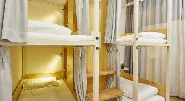 Кровать в общем номере Meego Qingwen Hotel Shanghai Jingan