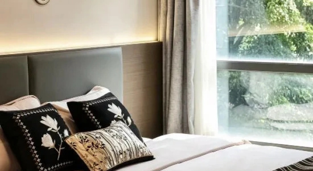 Кровать в общем номере The Beautiful Kitchen Apartment Hotel
