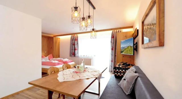 Четырёхместный люкс Deluxe с балконом и с видом на горы Hotel Eggerhof