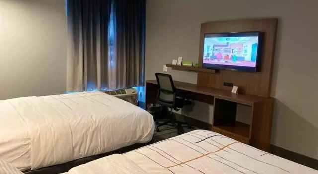 Четырёхместный номер Comfort La Quinta Inn & Suites Limon by Wyndham