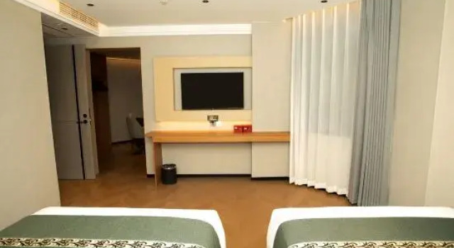 Люкс Deluxe Baowan Business Hotel (Xiushui Liansheng Shopping Plaza)