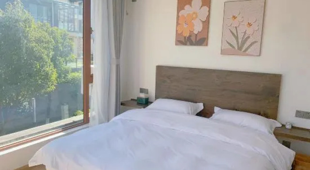 Люкс с 2 комнатами с балконом Yishan Guanlan Homestay(Gucheng Branch)
