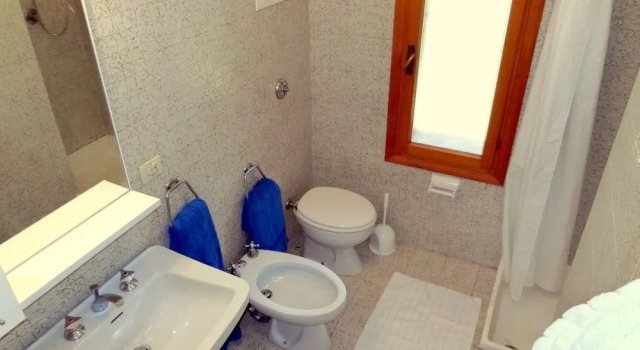 Апартаменты Lignano Riviera con 3 camere e giardino