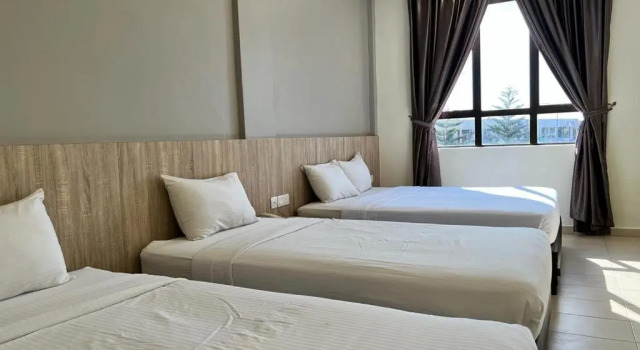 Четырёхместный номер Standard SiN LiEN HOTEL