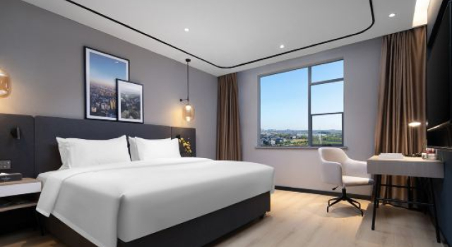 Люкс Deluxe Country Inn & Suites by Radisson Hotel (Hong'an Jingji Kaifaqu)