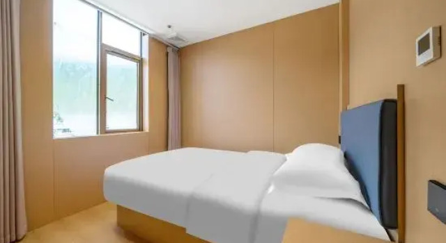 Люкс Deluxe Jiudinghong Business Hotel
