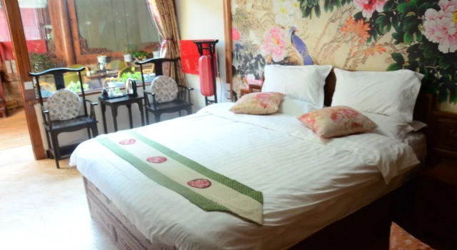 Lvyfamily hotel, Забронировать Отель Лицзян Юньнань, рядом с Улица Сквер-стрит Древнего города Даянь