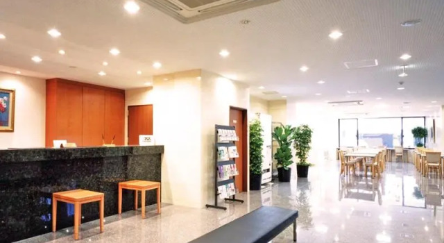 Кровать в общем номере Smile Hotel Shizuoka