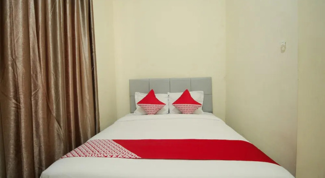 Номер Standard OYO 654 Fabio Guest House Syariah