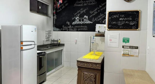 Кровать в общем номере Pousada Vila Praiana