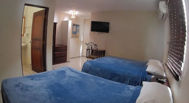 Четырёхместный номер Standard Дуплекс Hotel Maison Gautreaux