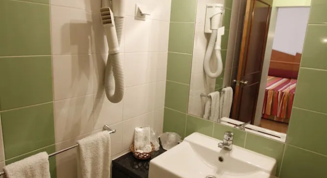 Четырёхместный номер Deluxe Pensao Praca Da Figueira