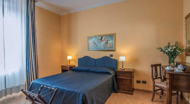 Четырёхместный номер Hotel Caracciolo