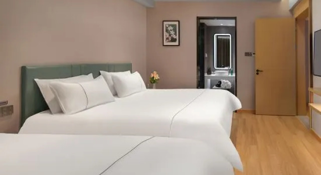Двухместный семейный люкс Superior Magnotel Hotel (Yancheng Sheyang Wanda Plaza Shuangshanbei Road)