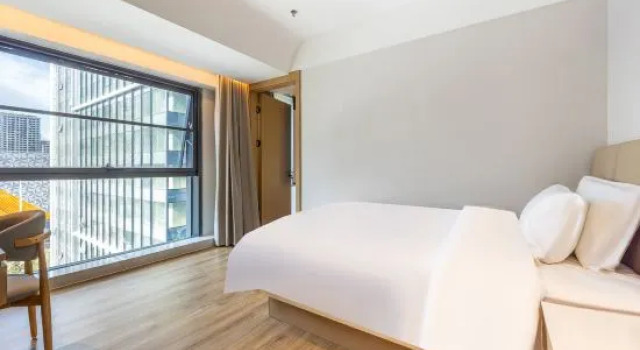 Люкс Xining Bochen Hotel (Chengbei District Wanda Plaza)
