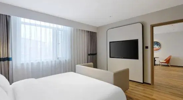 Люкс Deluxe Ni Hao Hotel (Huadian Dajie)