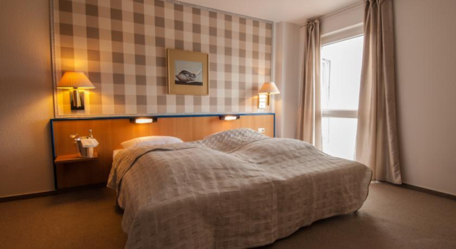 Hotel Am Park, Забронировать Отель Фрёнденберг Унна