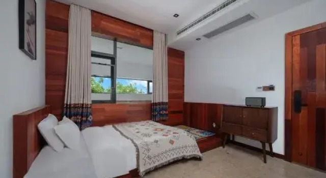 Семейный люкс с 2 комнатами Beihai Weizhou Island Yeli Courtyard Vacation Apartment (Beike Beach Lanqiao)