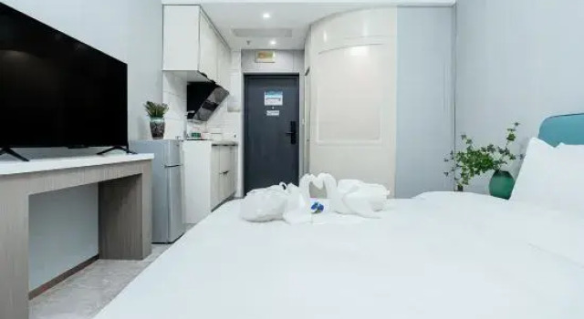 Семейный люкс Longkou Jinli Serviced Apartment Hotel (Longhu Tianjie Poly Plaza)