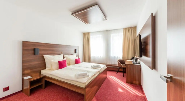Четырёхместный номер Deluxe Bohemia Inn Hotel