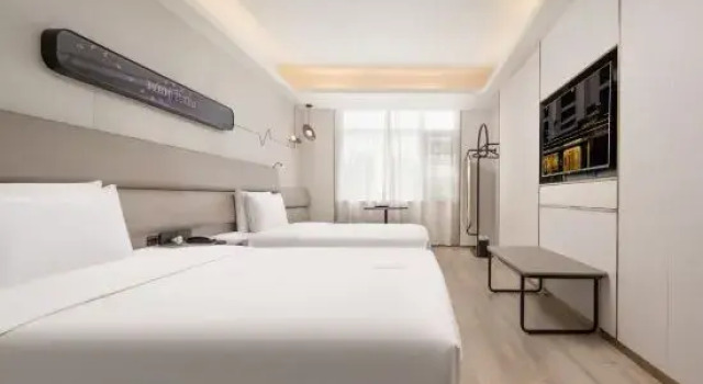 Трёхместный семейный люкс Qingyaju Hotel (Chengdu Wenjiang University Town)