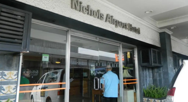 Кровать в общем номере Nichols Airport Hotel