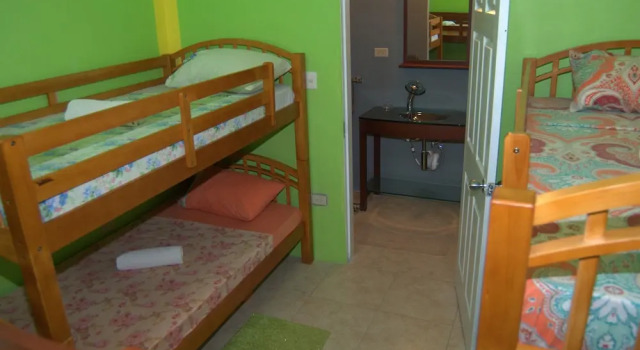 Кровать в общем номере (женский номер) Fish Tobago Guesthouse or Joy and Brandon Guesthouse