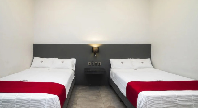 Четырёхместный номер Deluxe Hotel Río Puebla Centro