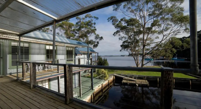 Suite 1 Schlafzimmer mit Meerblick Risby Cove Boutique Hotel
