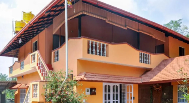 Кровать в общем номере Evergreen homestay by StayApart, Coorg