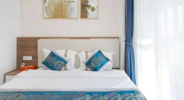 Двухместный люкс Luxury с 3 комнатами с балконом и с частичным видом на море Qianju Hotel (Sanya Bay Coconut Dream Corridor Branch)